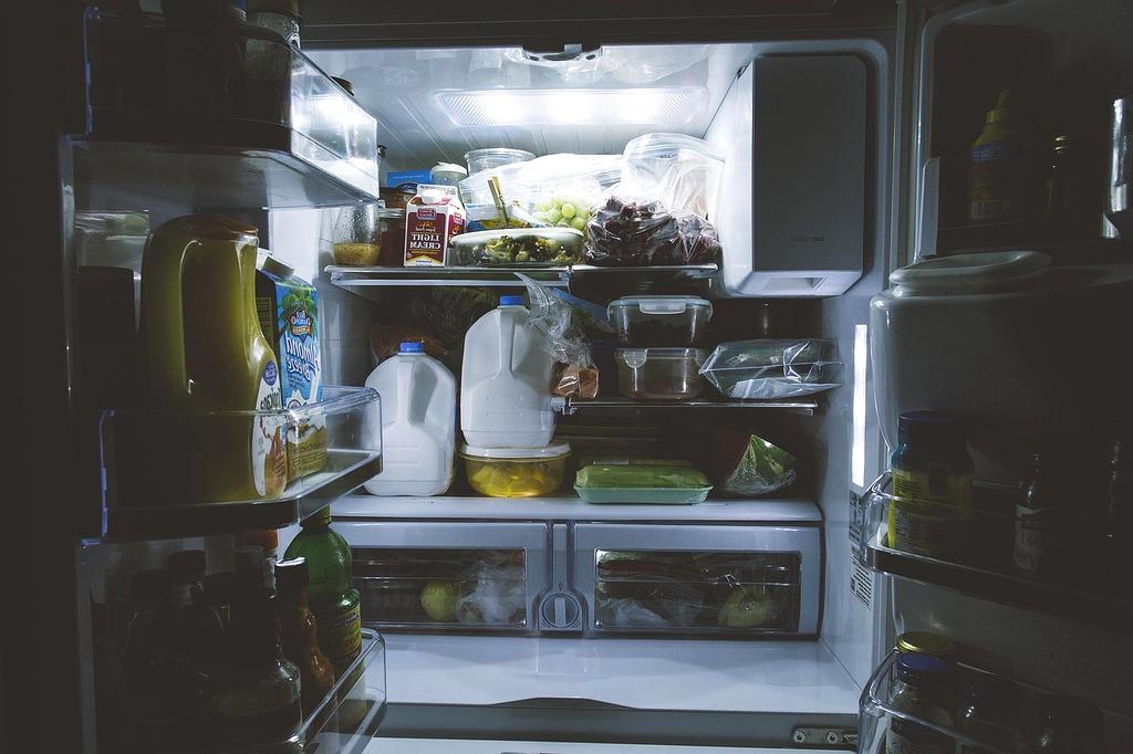 Stylish organized living room shelf with books and decor