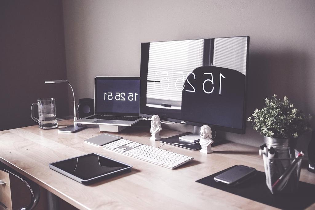 Custom organization plan sketches and 3D renderings on designer tablet with material samples