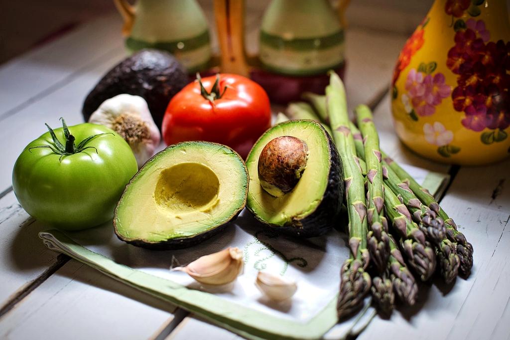 Neatly organized kitchen shelves with labeled jars and containers
